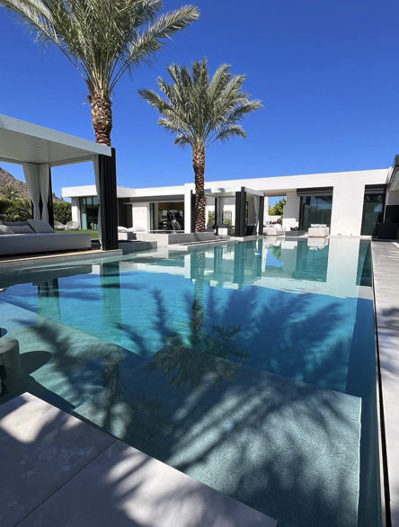 Ultra-modern estate pool with mirror water surface