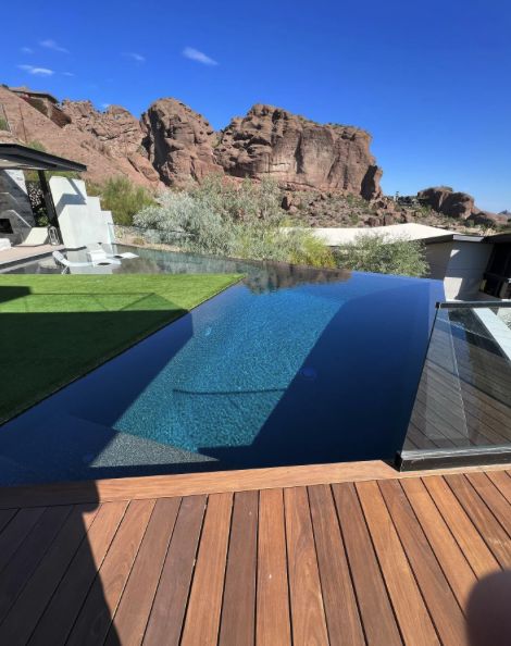 Infinity edge pool with a Camelback Mountain view